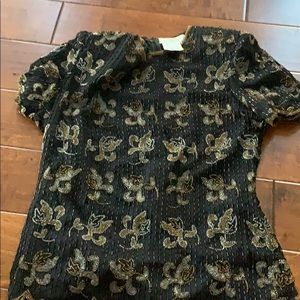 Beaded shirt with shoulder pads